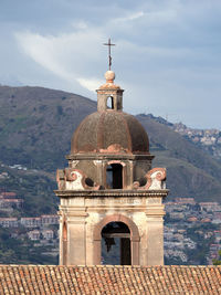 View of historic church tower against sky