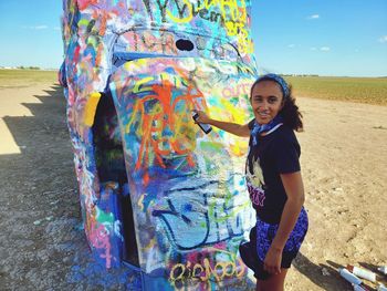  girl spray painting graffiti