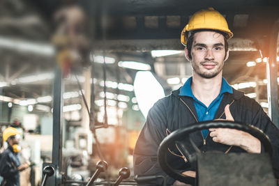 Portrait of man working in bus