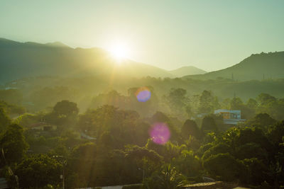 Scenic view of mountains against sky during sunset