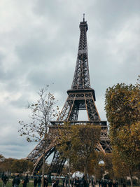 Tower against cloudy sky