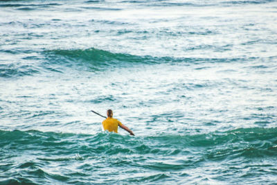 Man surfing in sea