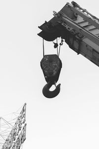 Low angle view of hanging against sky