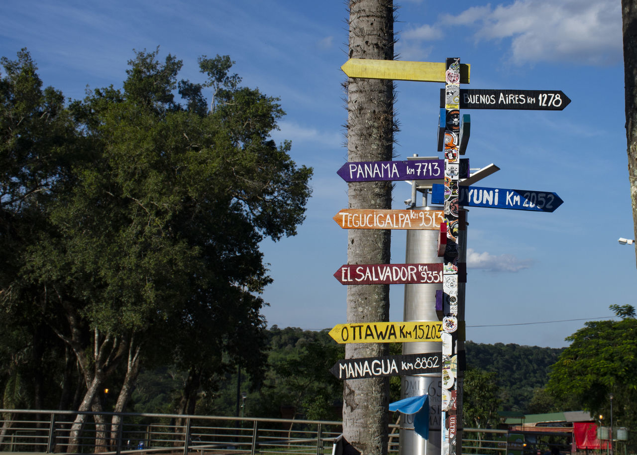 INFORMATION SIGN AGAINST TREES