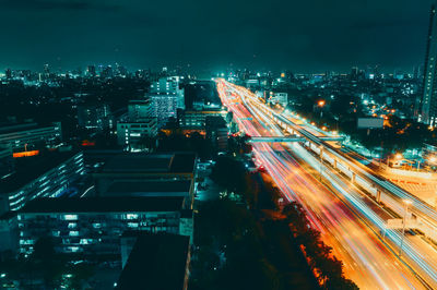 Aerial view of illuminated cityscape at night