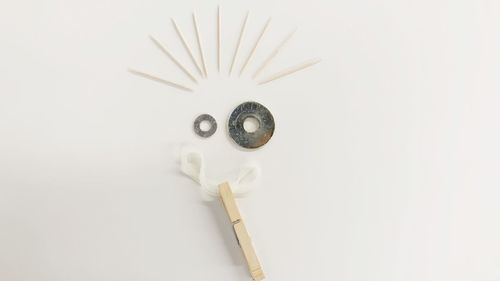 Close-up of electric lamp against white background