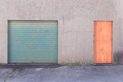 Closed door of building. closed complementary colors doors of building 