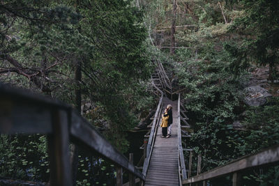 Couple on footbridge