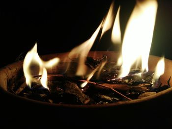 Close-up of burning candle