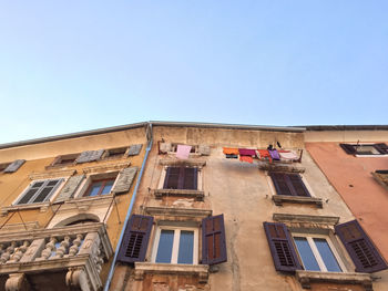 Low angle view of building against blue sky