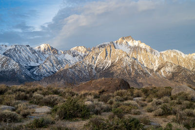 Scenic view of snowcapped mountains against sky