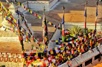 High angle view of multi colored flags hanging outdoors