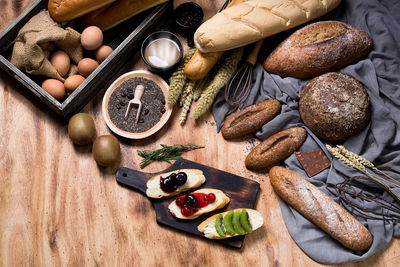 High angle view of various food on wooden table