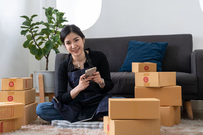 Young woman using phone