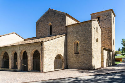 Exterior of historic building against clear sky