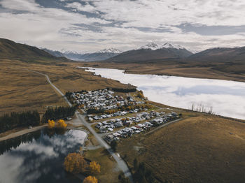 Lake clearwater village with the southern alps in the background. nz