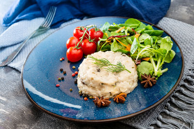 High angle view of meal served in plate on table