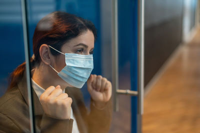 Close-up of woman drinking glass