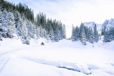 Scenic view of snow covered mountain against sky