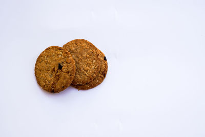 Close-up of cookies against white background