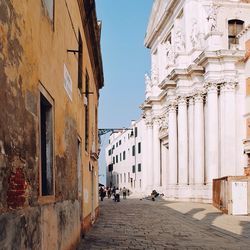 Narrow alley along buildings