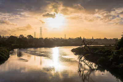 View of river against cloudy sky