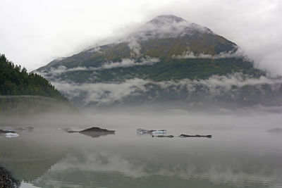 Valdez lake in the fog near valdez, alaska