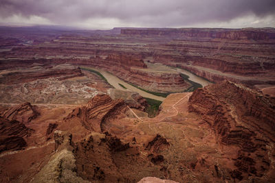 Scenic view of canyonlands national park against cloudy sky