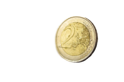 Close-up of coins on white background