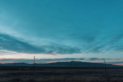 Scenic view of dramatic sky over land