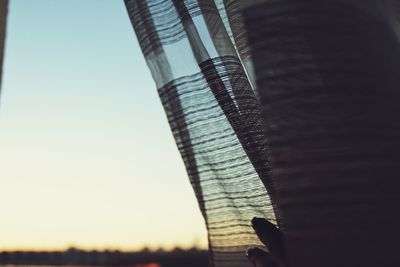 Close-up of cables against clear sky