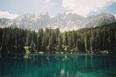 Scenic view of mountains and lake against sky