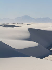 Gypsum sand dunes in white sands national park in late afternoon