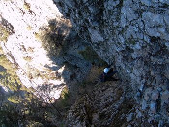 Shadow of person on rock in cave