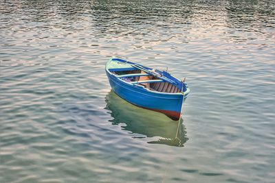 High angle view of boat moored in lake