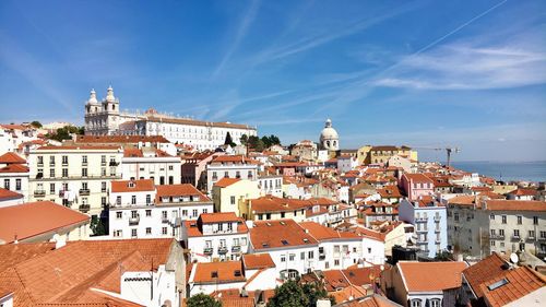 Lisbon cityscape against sky