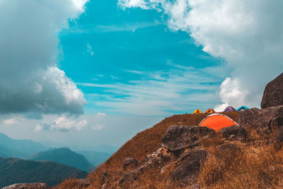 Panoramic view of sea and mountains against sky