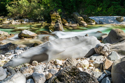 Boulders and rocks on the riverbed of the torre river. friuli to discover