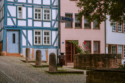 Houses by street in city