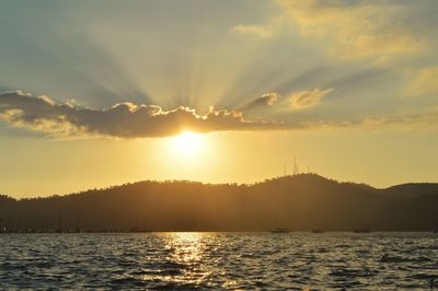 View of calm sea at sunset