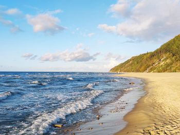 Scenic view of beach against sky