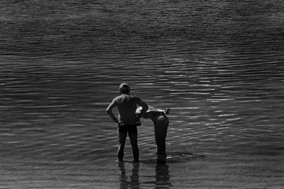 Woman standing in water