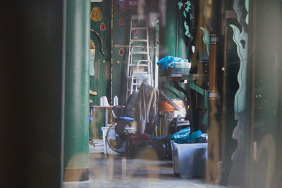 Rear view of woman standing in store