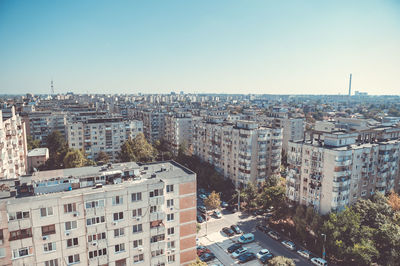High angle view of buildings against clear sky