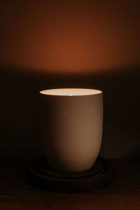 Close-up of coffee cup on table