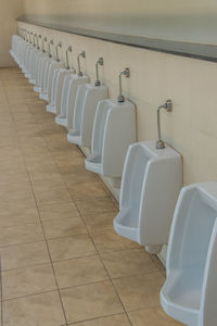 Urinals in public restroom