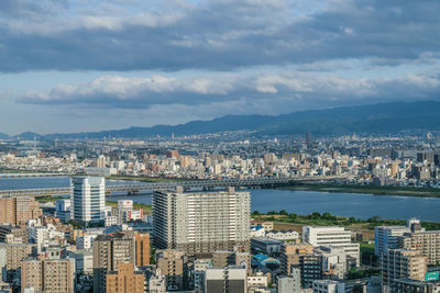 High angle shot of cityscape against the sky