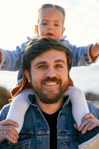 Portrait of smiling man with father