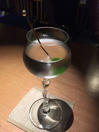 Close-up of wineglass on table