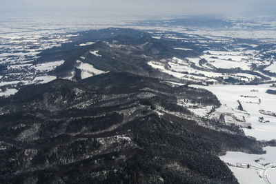 Aerial view of snow covered landscape